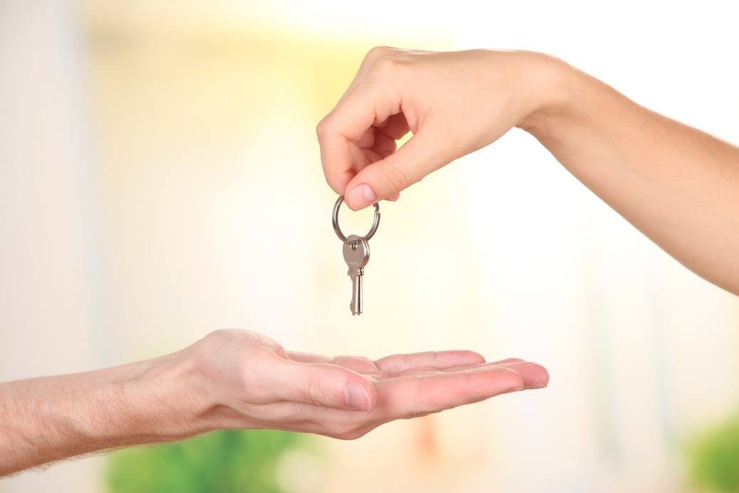 Transfer of House Key, on Bright Background