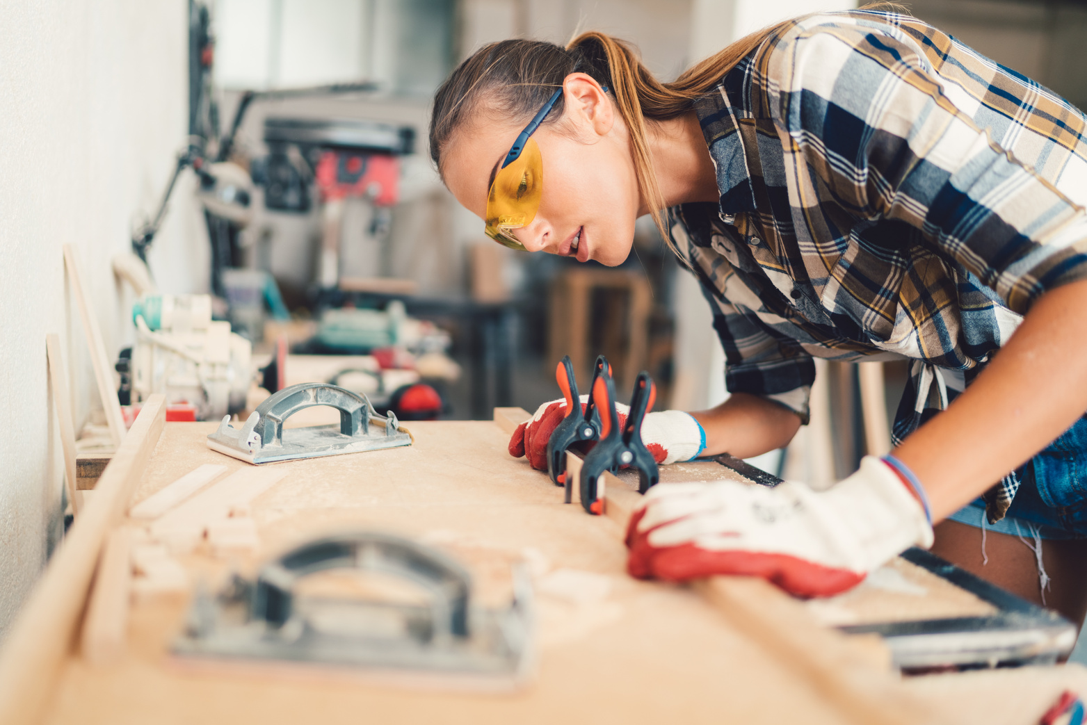 Craftswoman in the carpentry workshop